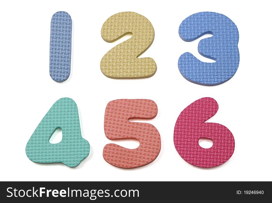 Colorful foam numbers one to six on a white background. Colorful foam numbers one to six on a white background