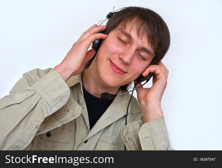 The guy listening in headphones music-relax. The guy listening in headphones music-relax