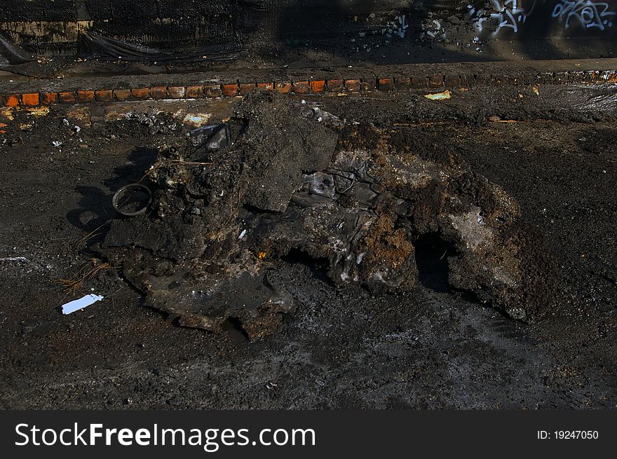 Fragment of a car burned after a theft.