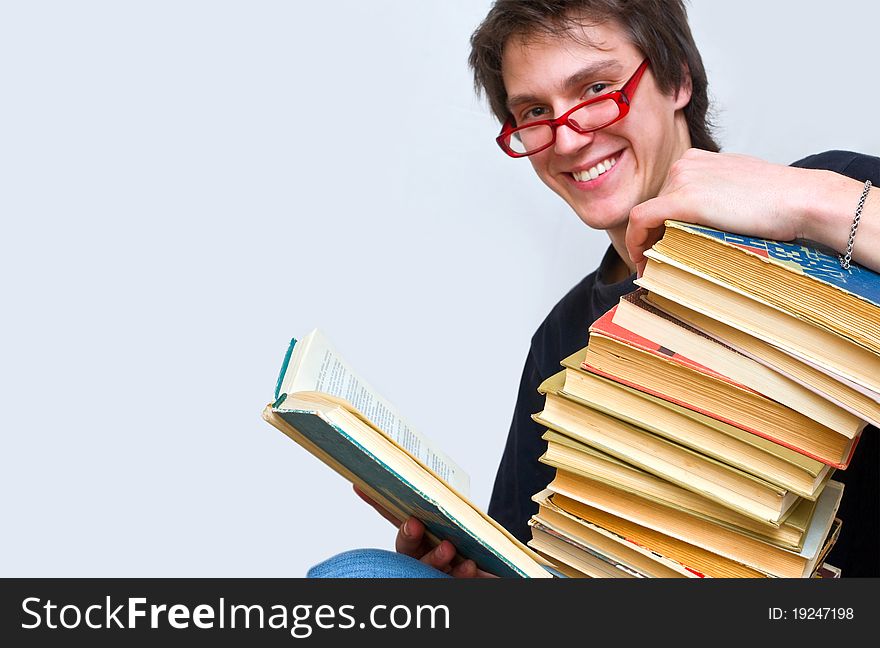 The student and his mountain textbooks