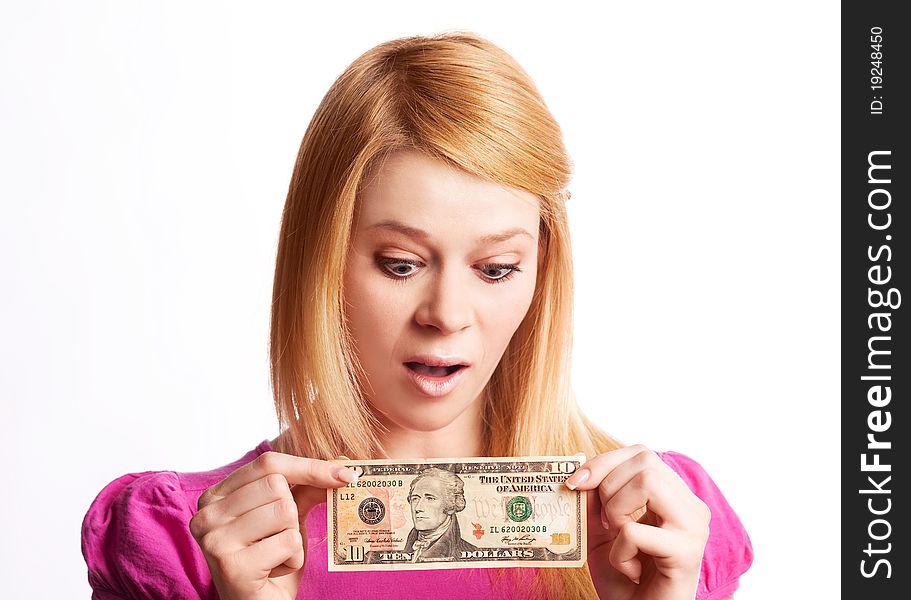 Blond girl woman with a ten dollars banknote, isolated against white background. Blond girl woman with a ten dollars banknote, isolated against white background