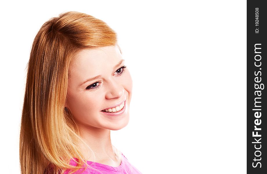 Beautiful blond laughing girl against white background