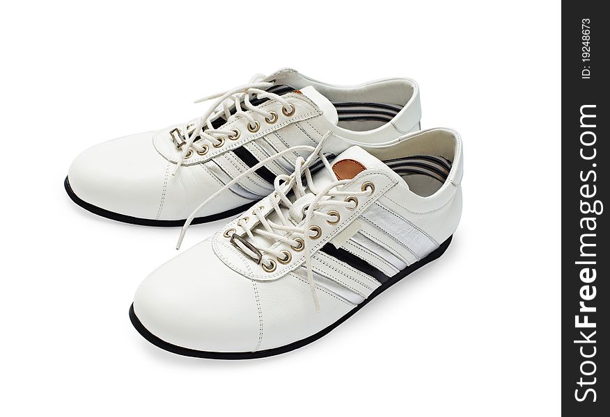 White sports shoes with laces. White sports shoes with laces