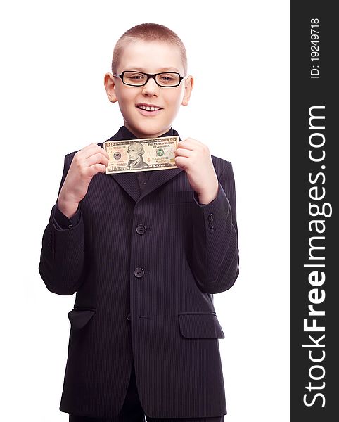 Ten year old blond boy wearing a costume with ten dollars in his hands. Ten year old blond boy wearing a costume with ten dollars in his hands