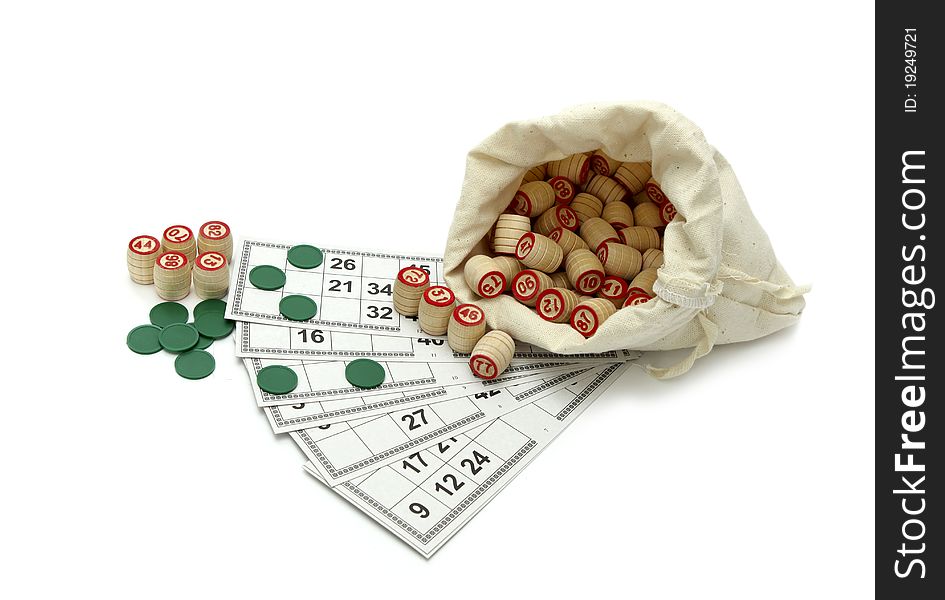 Lotto game: wooden kegs in a sack and game cards isolated on white background