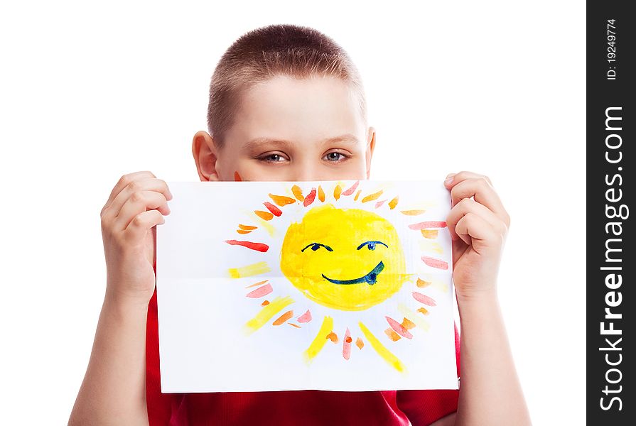 Cute ten year old boy with a watercolor picture of the sun. Cute ten year old boy with a watercolor picture of the sun