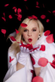 Woman White Coat Blowing Roses Royalty Free Stock Image Woman White Coat Blowing Roses Royalty Free Stock Image
