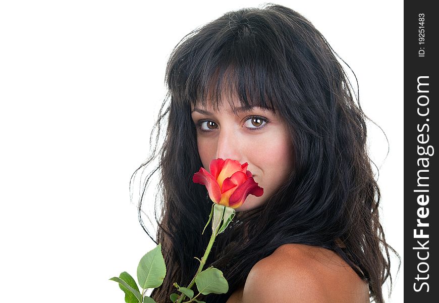 Beautiful young woman smelling a fresh red rose. Beautiful young woman smelling a fresh red rose.