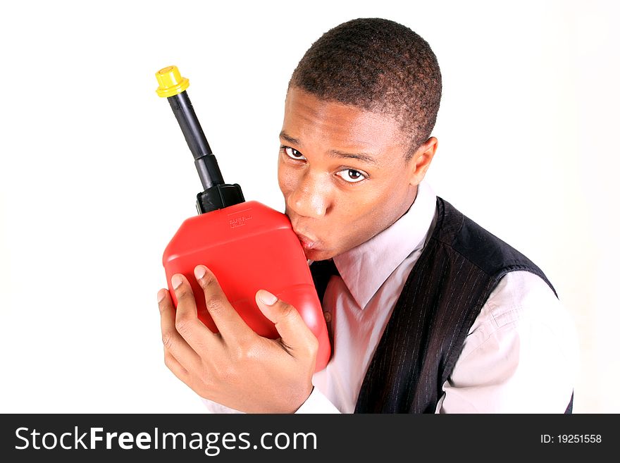 A young man holding a gas can. A young man holding a gas can