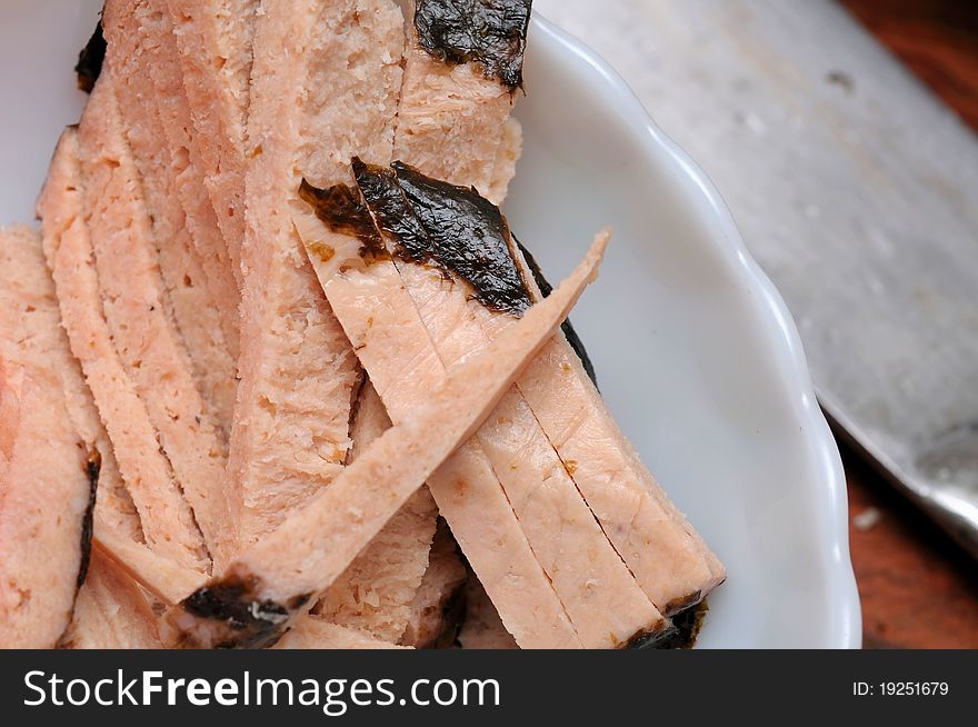 Raw fish slices prepared as food ingredients. Raw fish slices prepared as food ingredients.