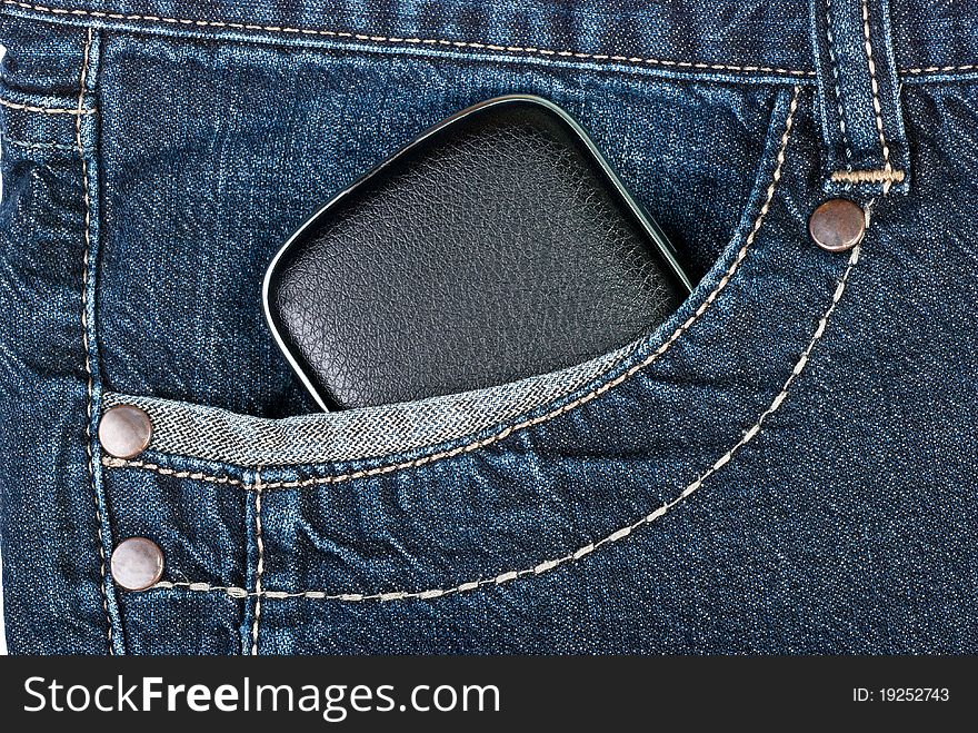 A phone in jeans pocket