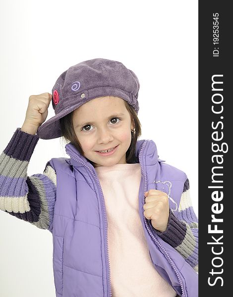 Young fashion model posing with purple cap and jacket. Young fashion model posing with purple cap and jacket