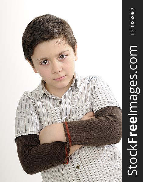 Cute school boy posing in studio. Cute school boy posing in studio