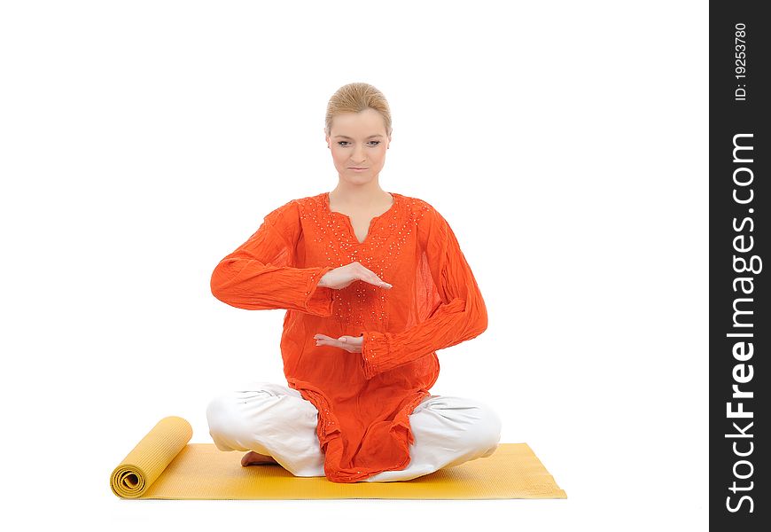 Series or yoga photos. young meditating woman on yellow pilates mat. Series or yoga photos. young meditating woman on yellow pilates mat