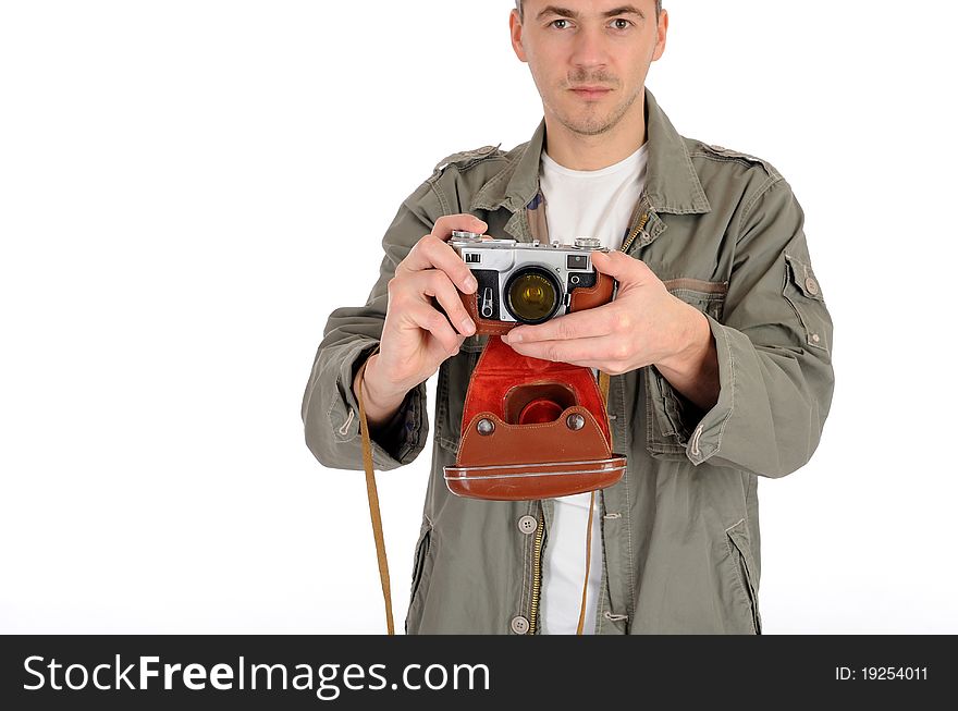 Young professional photographer with old retro film camera. isolated on white background. Young professional photographer with old retro film camera. isolated on white background
