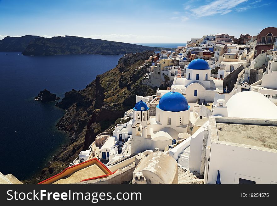 The famous ortodox churches at Oia (Ia) village on Santorini island. The famous ortodox churches at Oia (Ia) village on Santorini island.