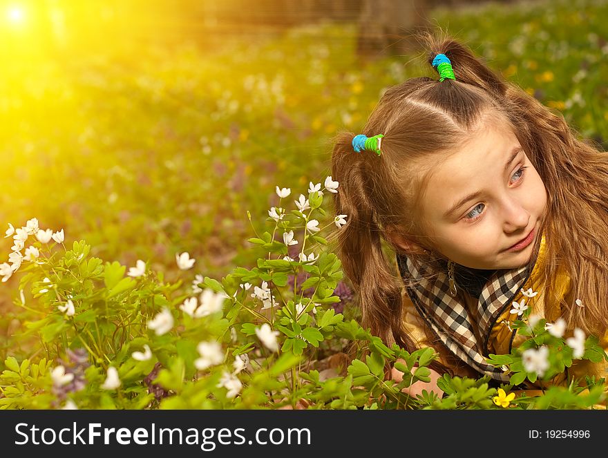 Little girl portrait at spring forest flowers. Little girl portrait at spring forest flowers