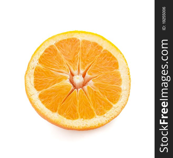 Half of a ripe orange on a white background