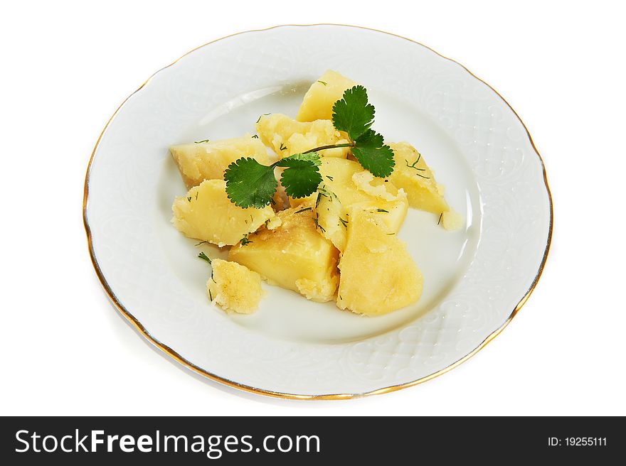 Boiled potatoes isolated on plate on white background