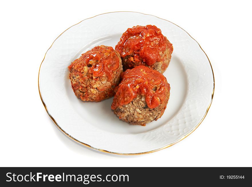 Meatballs in tomato sauce isolated on white background