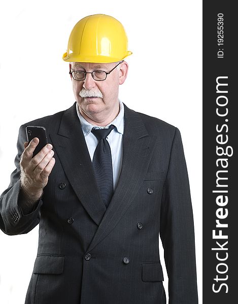 Contractor with his phone isolated on white. Contractor with his phone isolated on white