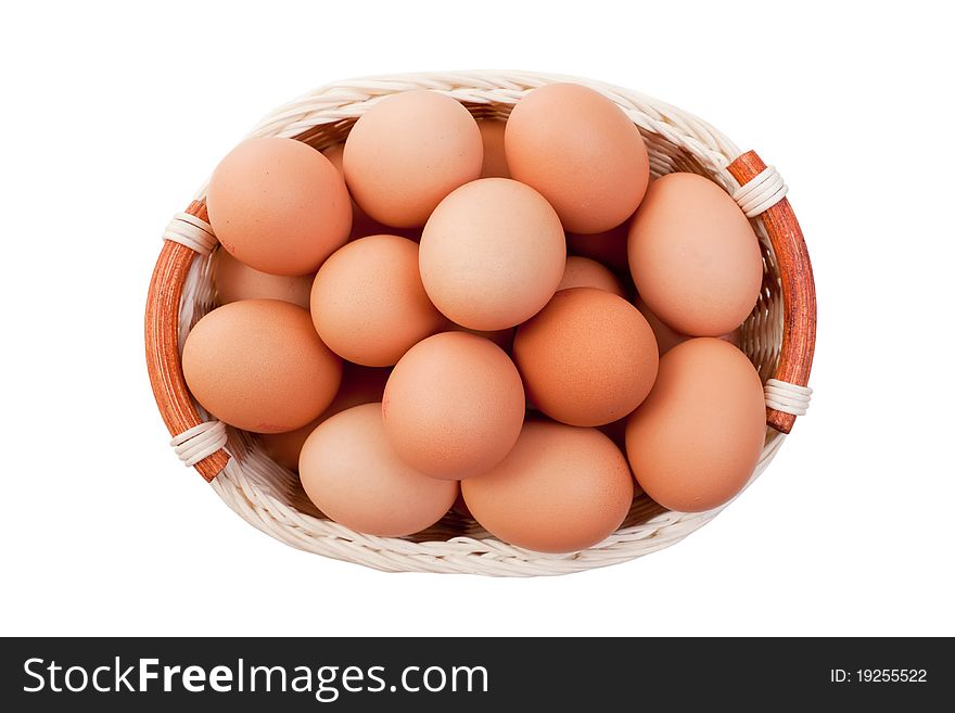 Eggs In Basket Isolated On White