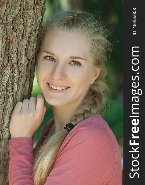 Portrait Of A Young Girl In The Park