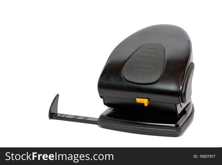 Black office hole punch on a white background