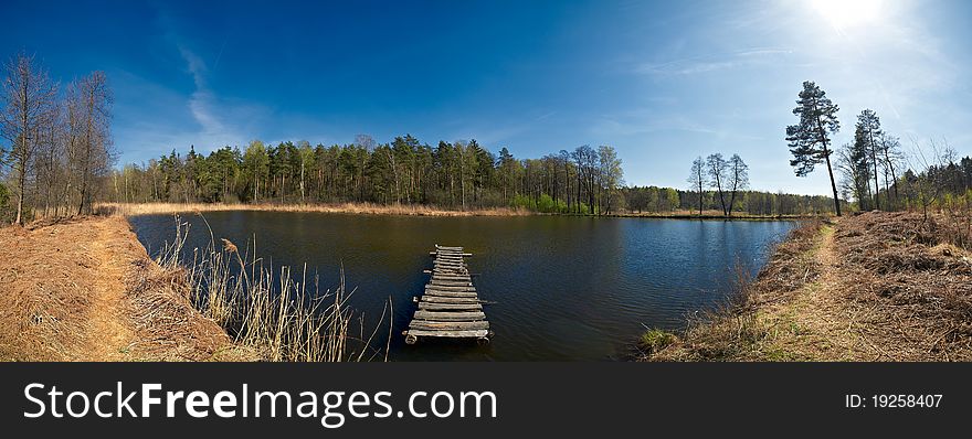 Lake with a bridge panorama