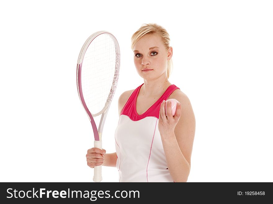 A beautiful teen girl holding her racket and pink ball. A beautiful teen girl holding her racket and pink ball.