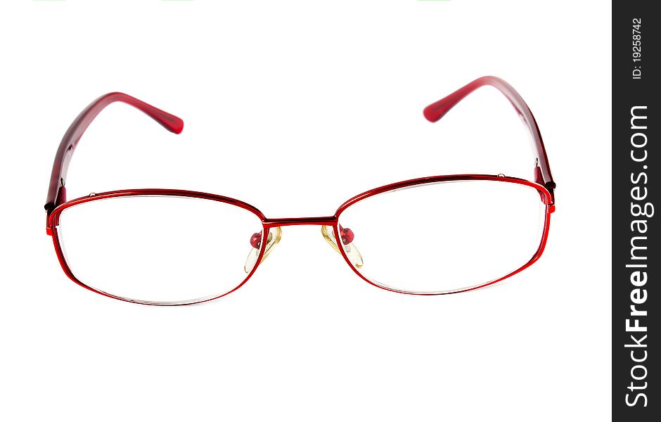 Red glasses on a white background