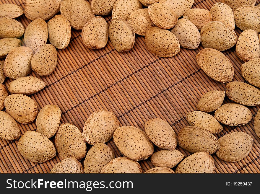 Almond nuts background with space for notes
