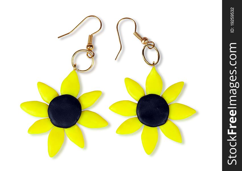 Earrings-sunflower of plastic clay. Isolated on white with clipping path