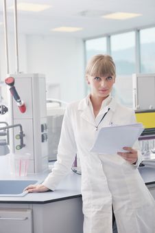 Female Researcher Holding Up A Test Tube In Lab Royalty Free Stock Image Female Researcher Holding Up A Test Tube In Lab Royalty Free Stock Image