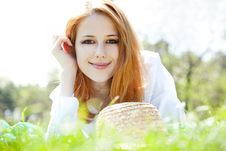 Red-haired Girl With Hat At The Park. Royalty Free Stock Photo