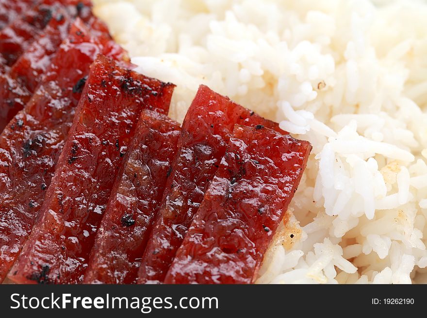 Close up of barbecue meat with white rice. Close up of barbecue meat with white rice.