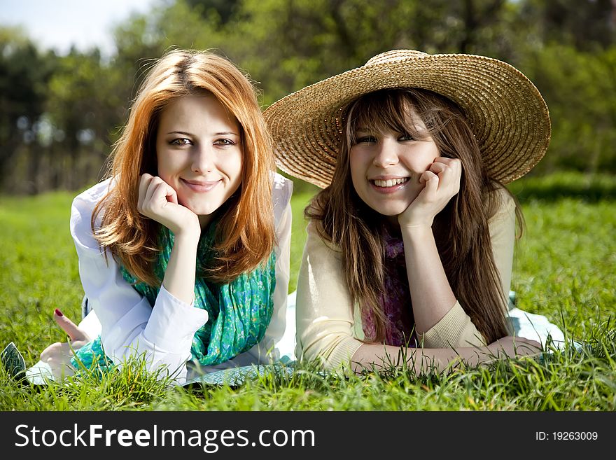 Girlfriends At Green Grass In The Park