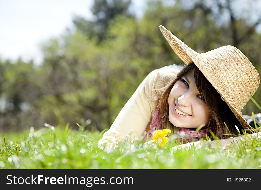 Beautiful Brunette Girl In Hat At The Park