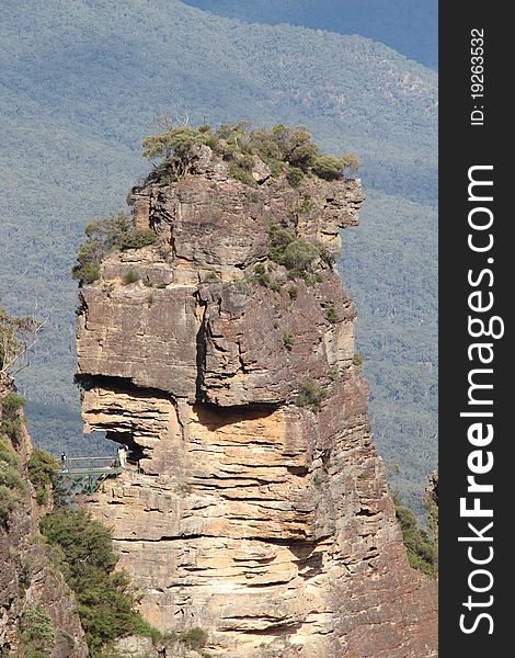 The first of the Three Sisters Rock Formation in the Blue Mountains, New South Wales, Australia. The first of the Three Sisters Rock Formation in the Blue Mountains, New South Wales, Australia.
