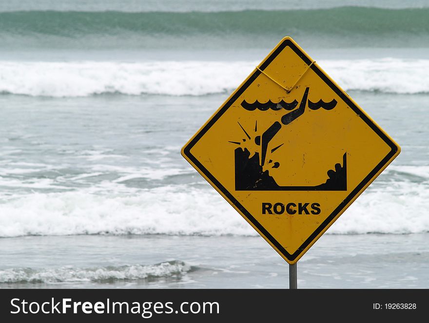 Warning sign on the beach, Raglan, New Zealand