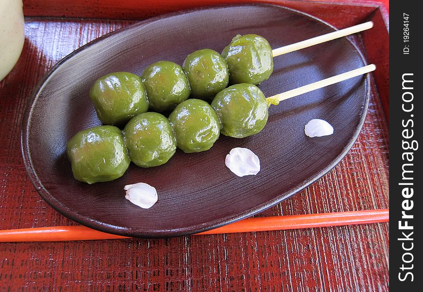 Closup view of the tasty Japanese Dango, which is traditional Japanese dessert that is served with tea. Closup view of the tasty Japanese Dango, which is traditional Japanese dessert that is served with tea.