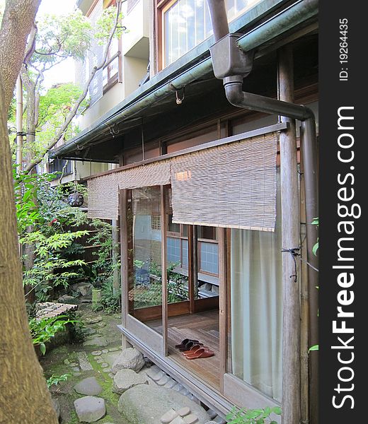 A very traditional Japanese town house in the down town of the ancient Japanese city of Kyoto. A very traditional Japanese town house in the down town of the ancient Japanese city of Kyoto.