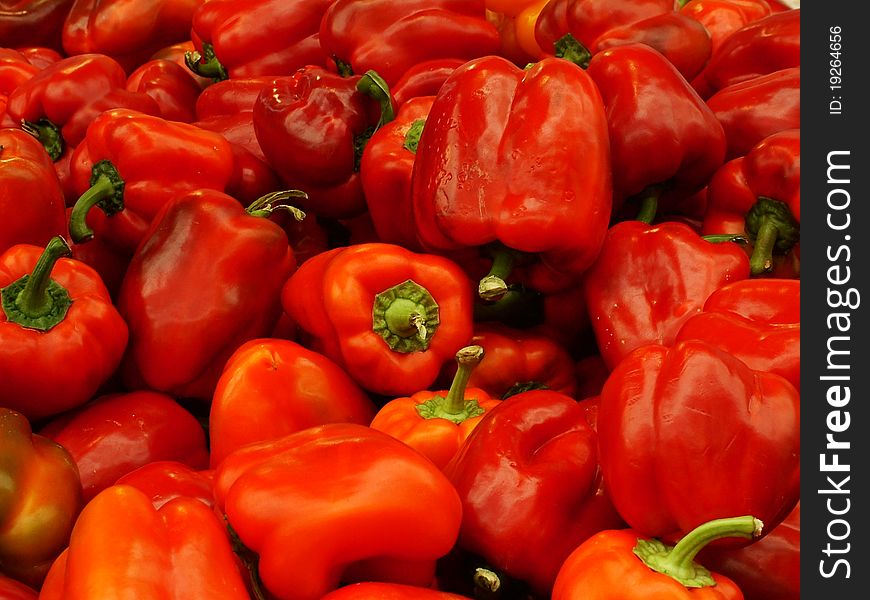 Many Fresh Red Peppers on the Market