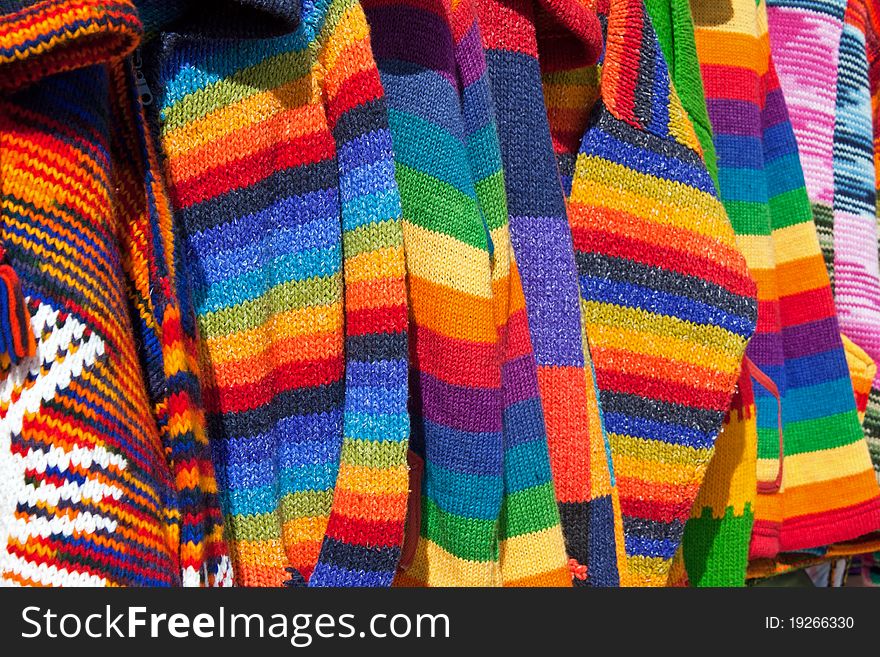 Close up of the texture of several colorful wool clothes. Close up of the texture of several colorful wool clothes