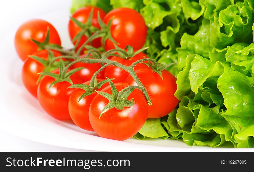 Ingredients for a fresh and healthy salad with tomatoes. Ingredients for a fresh and healthy salad with tomatoes