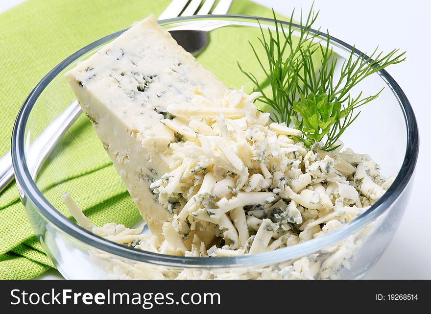 Blue cheese and fresh dill in a bowl