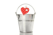 Metal Bucket With A Pin With A Heart Stock Photo