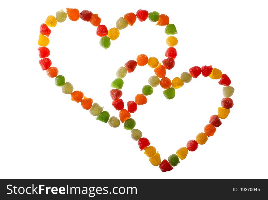 Love shape colorful candies isolated on white. Love shape colorful candies isolated on white