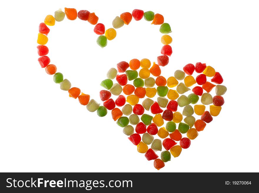 Love shape colorful candies isolated on white. Love shape colorful candies isolated on white