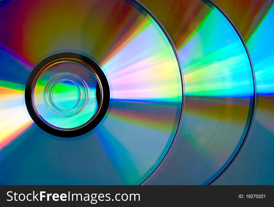 Several compact discs with a beautiful reflection. Several compact discs with a beautiful reflection
